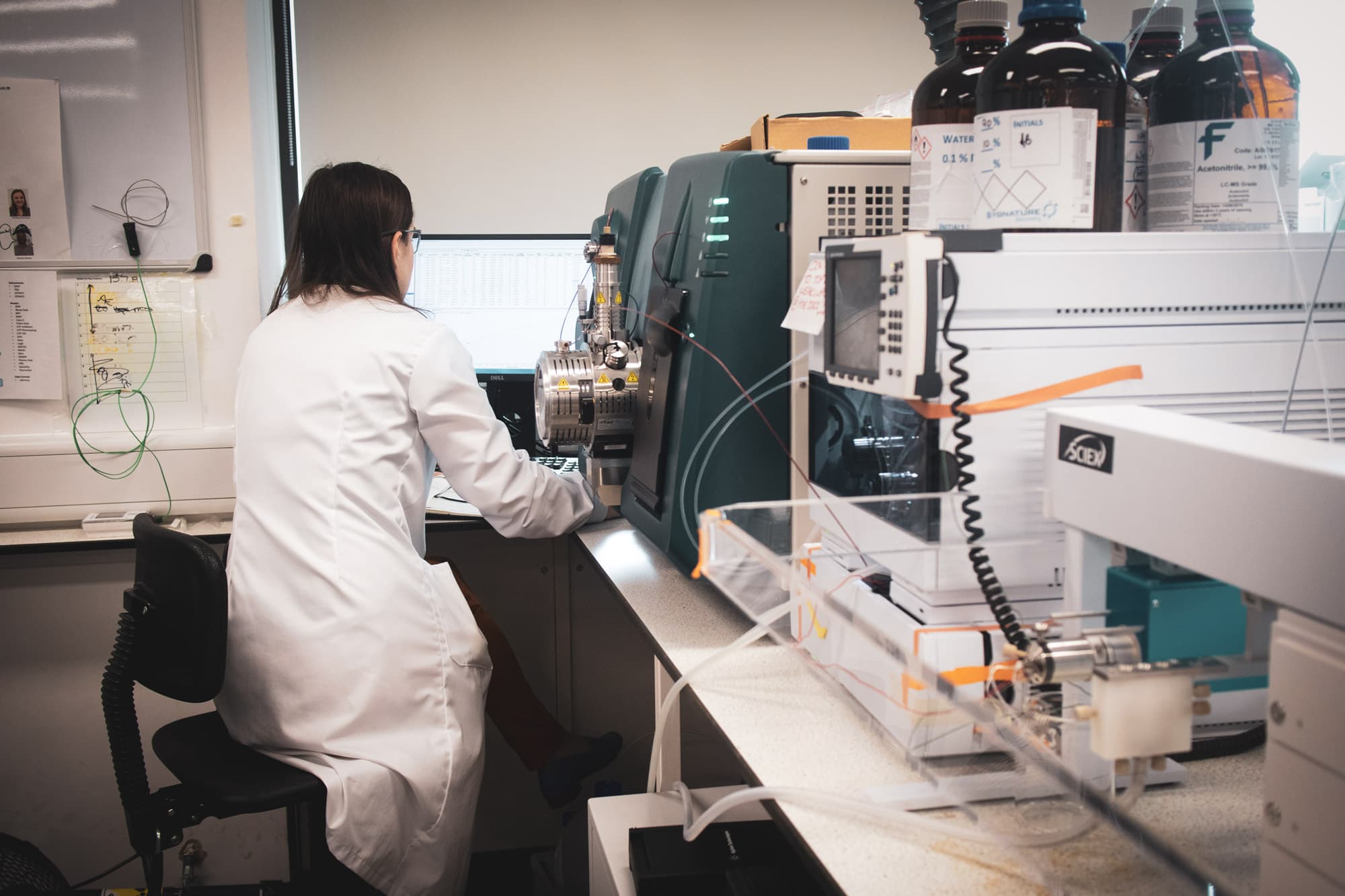 Laboratory environment with advanced analytical equipment used for biotransformation studies and metabolite profiling via LC/MS/MS techniques.