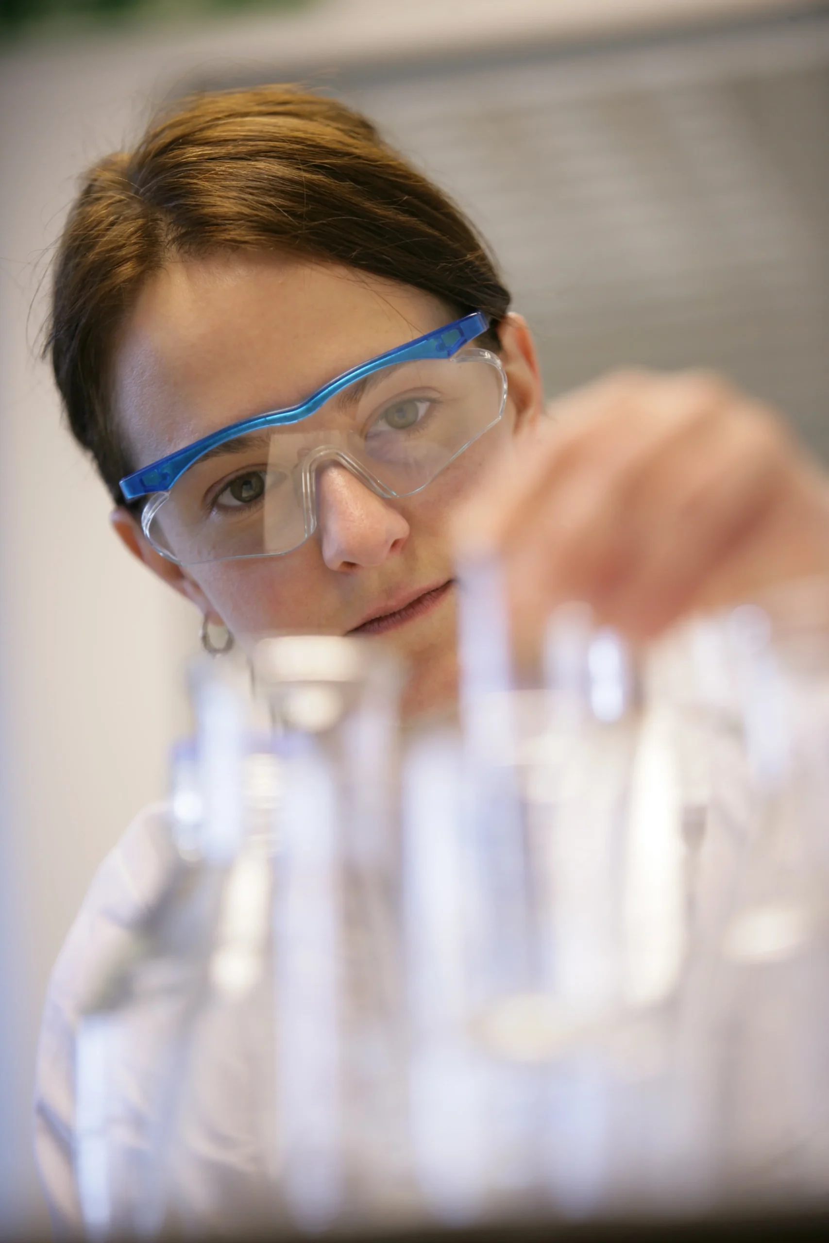 Laboratory setting with scientific equipment and test tubes, representing tailored, modality-agnostic drug discovery solutions for diverse therapeutic approaches.