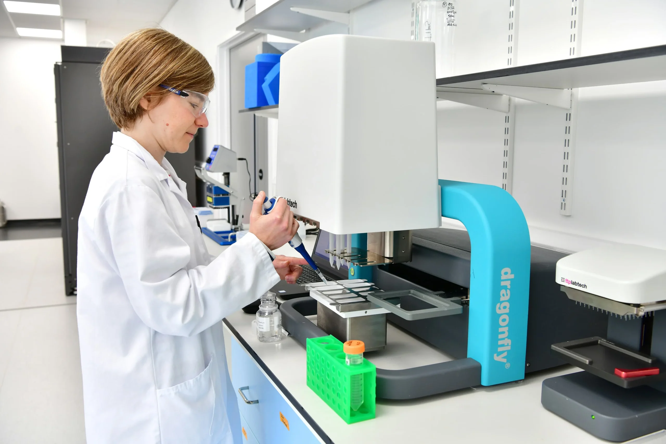 Laboratory setup with automated crystallization equipment used for high-throughput screening and optimization of protein crystalsLaboratory setup with automated crystallization equipment used for high-throughput screening and optimization of protein crystals