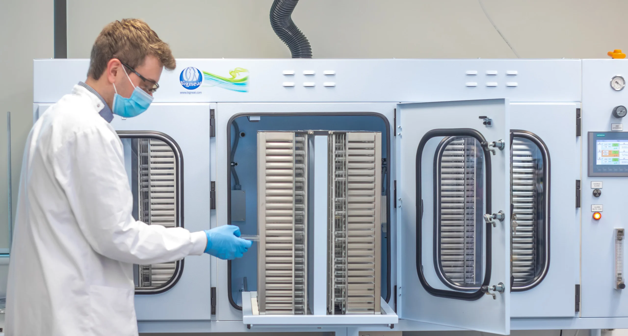 Laboratory quality control process showing equipment used for LCMS analysis and comprehensive QC in hit validation to ensure accuracy in drug discovery.
