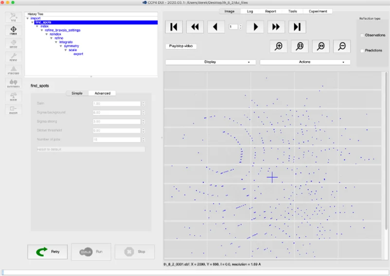 Software interface for crystallographic data analysis showing a diffraction pattern with blue reflection spots distributed across a detector image. The left panel contains a processing workflow and spot-finding settings, while the main panel displays the indexed diffraction data.